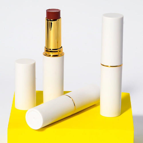 White tube lip gloss with rich, silky, lightweight matte color